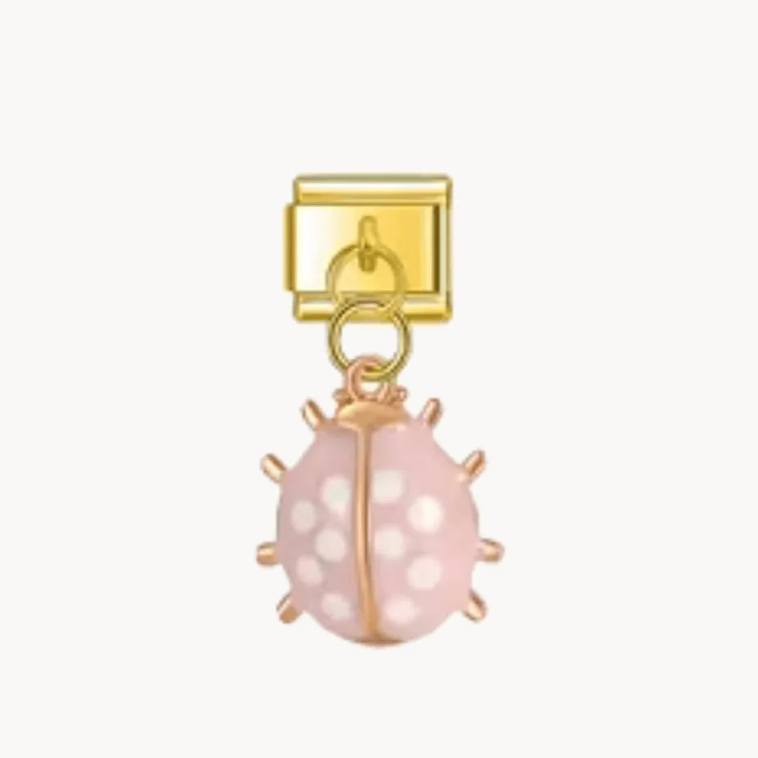 Pendentif coccinelle doré - rose